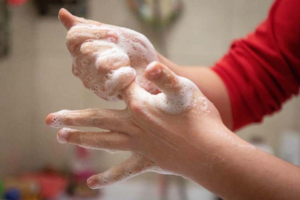 child washing hands thoroughly with soap and water 2026 03 09 05 45 52 utc
