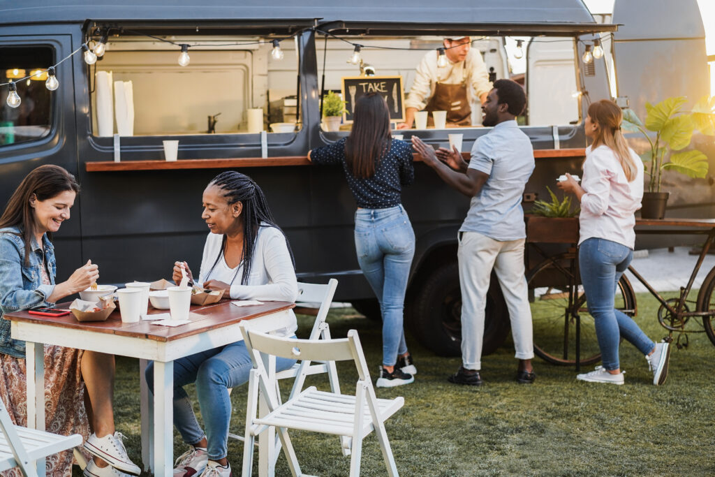multiracial people eating food truck gourmet food 2025 02 21 16 22 14 utc
